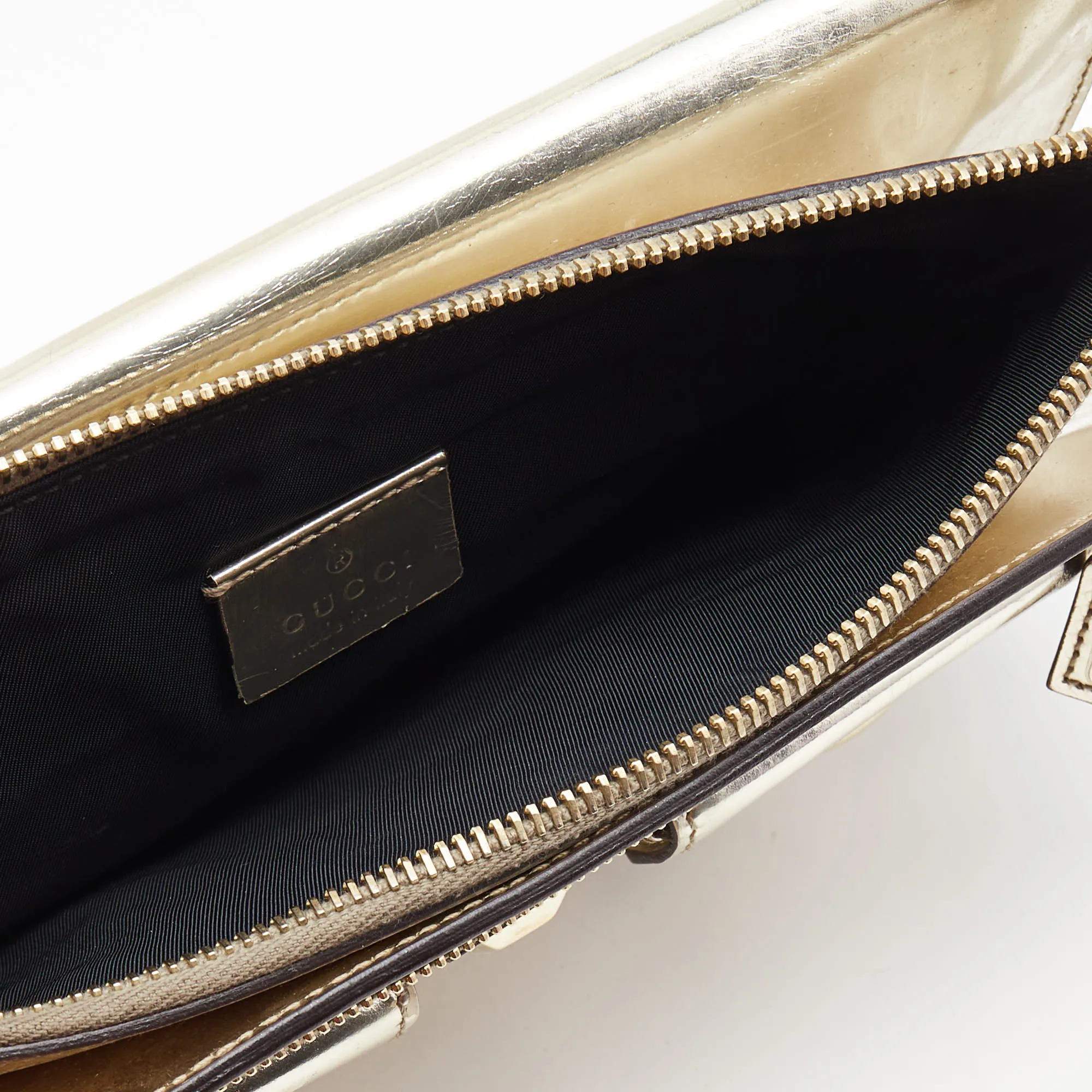 Gucci  Gold Laminate Leather Studded Evening Wristlet Clutch