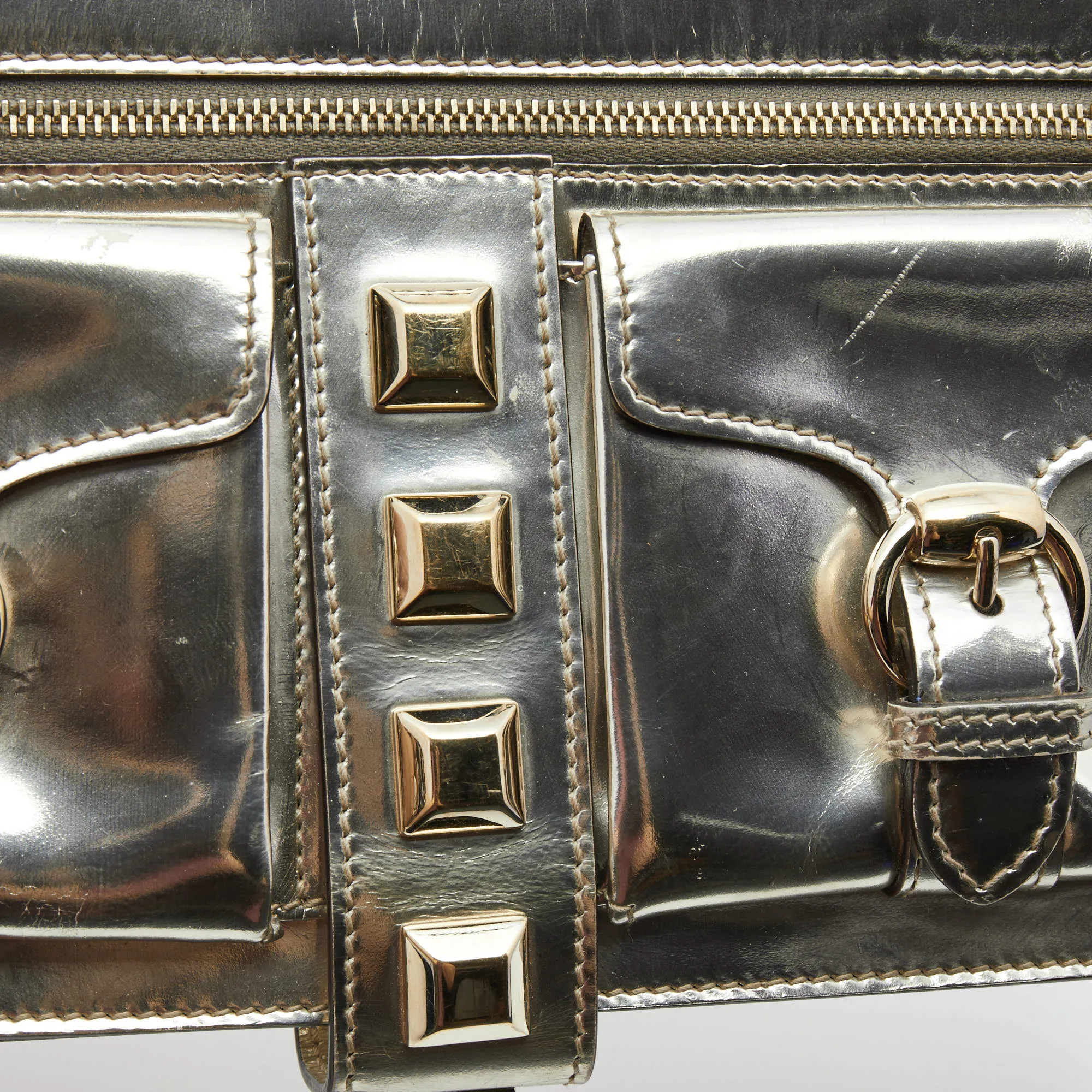 Gucci  Gold Laminate Leather Studded Evening Wristlet Clutch